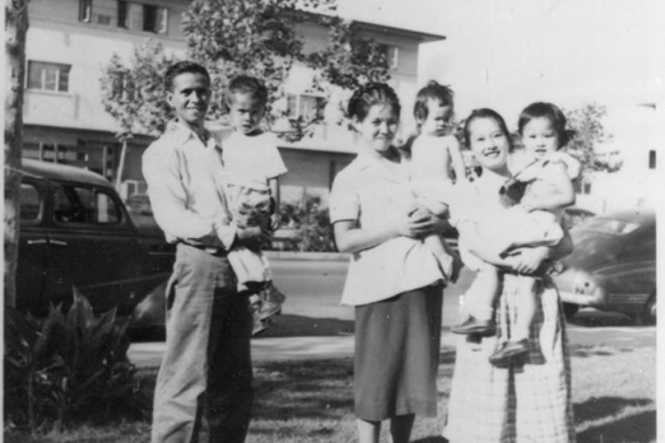 A couple with their children